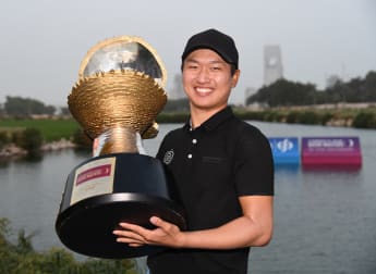 Wang jumps to second in Race to Dubai after play-off win in Qatar