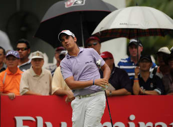 Manassero finishes strongly before suspension