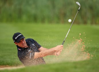 McGinley ends on a high in Wales