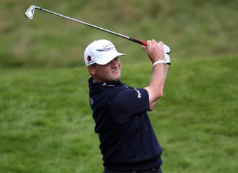 Lawrie claims slender lead