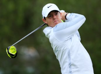McIlroy marches into quarter-finals