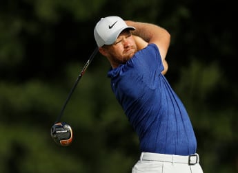 Lewis lauds his putter after superb 61