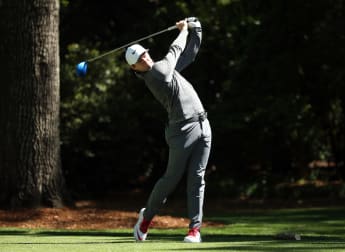 McIlroy and Spieth set for Saturday showdown