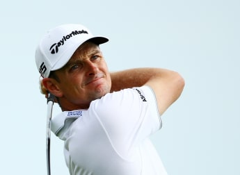 Rose happy with opening round