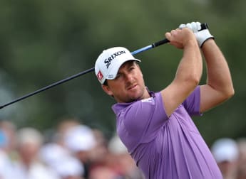 McDowell leads Scott pursuit