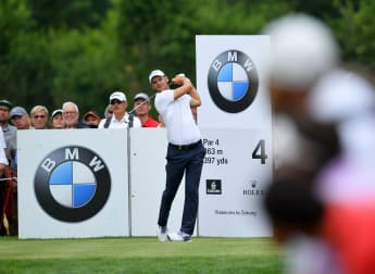 Kaymer thrills fans in stormy Munich