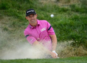 Harrington charges into contention