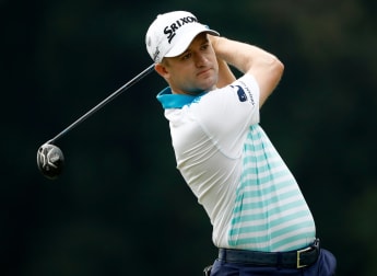 Knox off to a flier at stormy Firestone