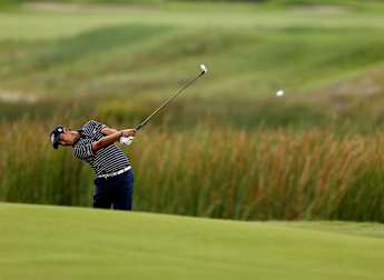 Early-bird Manassero pleased with solid start