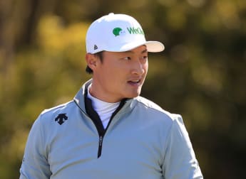 Li storms into US PGA lead early on day two