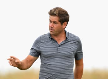 Rock holds halfway lead after thrilling Friday