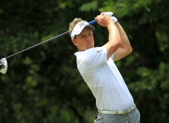 Donald in contention after charge