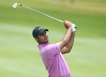 Sharma stays ahead in stormy Johannesburg