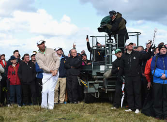 Harrington shines on home soil