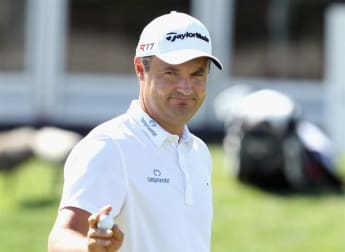 Khan pleased to be in the hunt