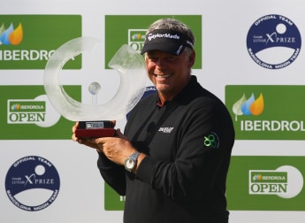 Clarke edges out Wood to claim title
