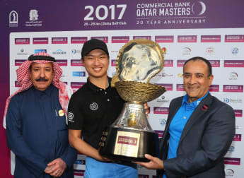 Wang claims dramatic triumph in Qatar