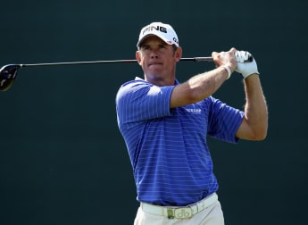 Westwood leads congested field