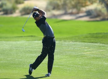 Day holds firm to reach last four