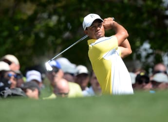 Woods surges into contention