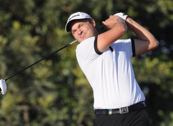 Edfors and Khan join chasing pack