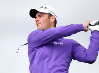 Kaymer battles back against Donald