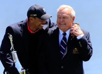 Woods returns to top spot