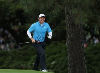 McIlroy and Fleetwood pile pressure on Reed