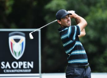Schwartzel blazes clear