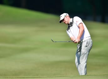 Warren surges into Malaysia lead