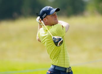 Horsey gallops into first round lead