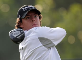 Majestic McIlroy leads with Karlsson