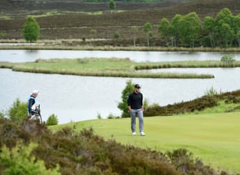 Boyd gets a little help from his friends to lead in Scotland 