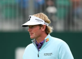 Snedeker enters record books with brilliant 64