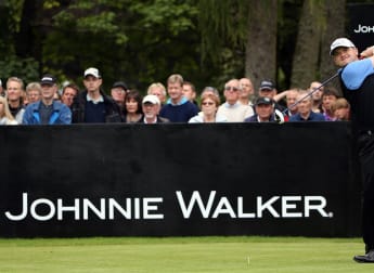 Lawrie extends advantage