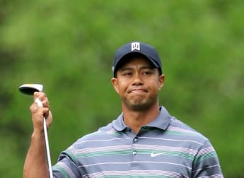 Watson shines as Woods returns