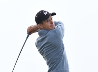 Grinding Huizing carves out narrow lead in France