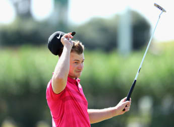 Fisher cards historic 59 to share Portugal lead