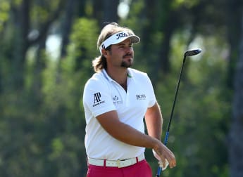 Dubuisson takes share of Turkey lead