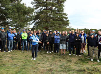 Wallace shows grit on home soil