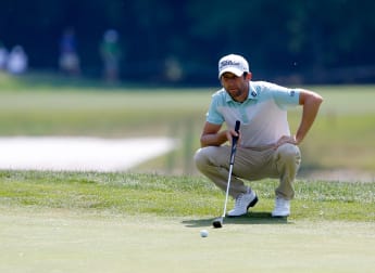 Bourdy two clear of Cabrera-Bello as storms close in