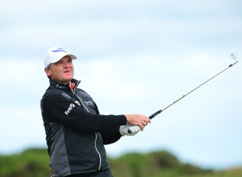 Lawrie shines on home soil