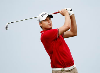 Watney claims share of lead with record round