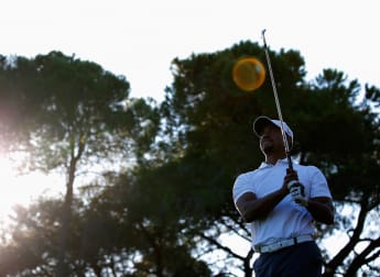 Woods puts comeback on hold