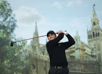 Molinari shines in Seville showers