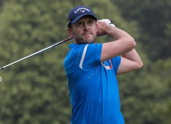 Manley retains lead in Belgium