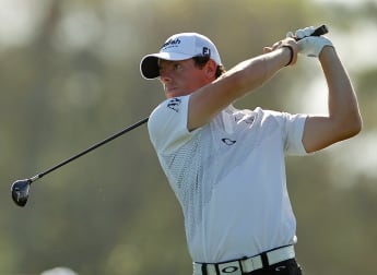 McIlroy leaves it late to lead