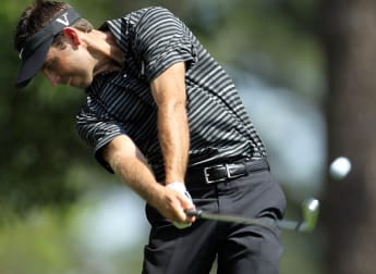 Schwartzel joins McIlroy in front