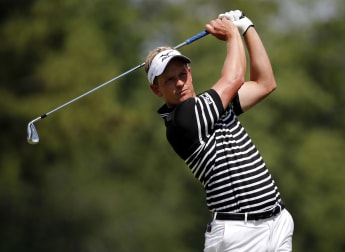 Donald and Schwartzel hit the front