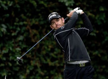 Oosthuizen fights back into contention